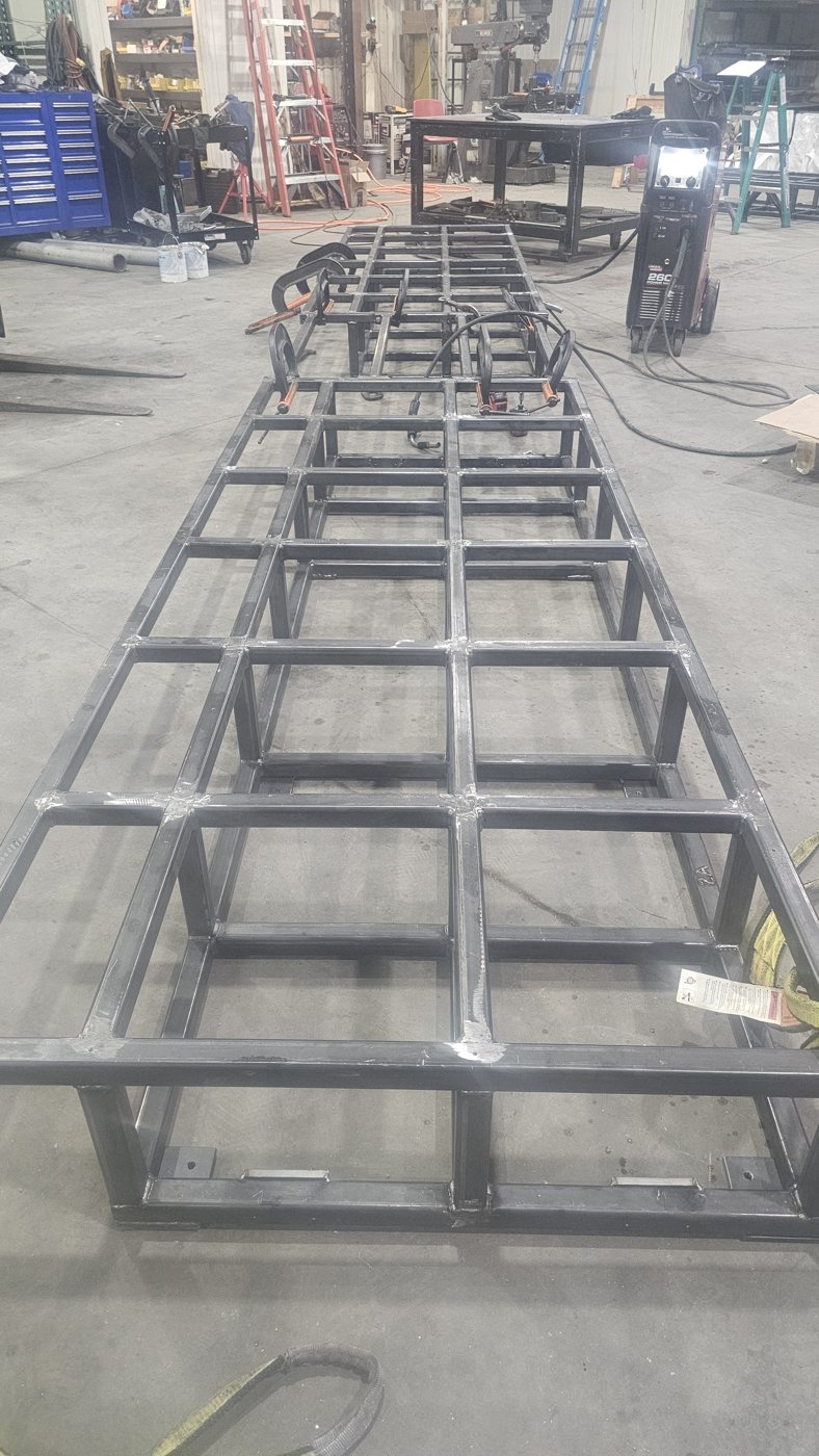 Heavy duty machine platform steel frame under construction in the shop