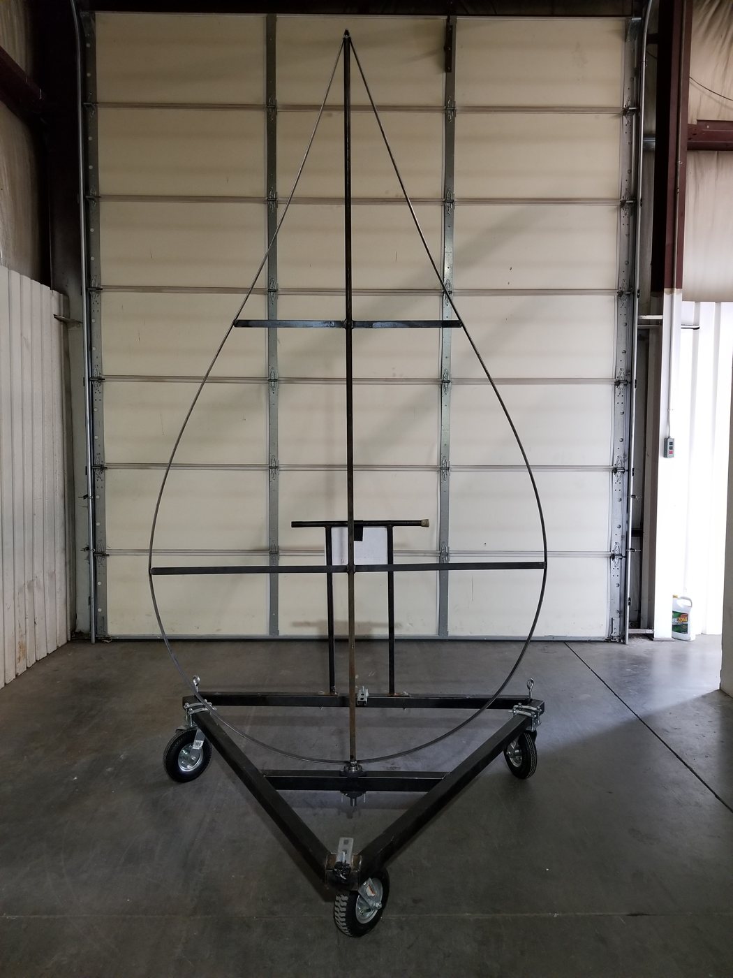 Water drop prop steel frame on 3-legged stand in the shop