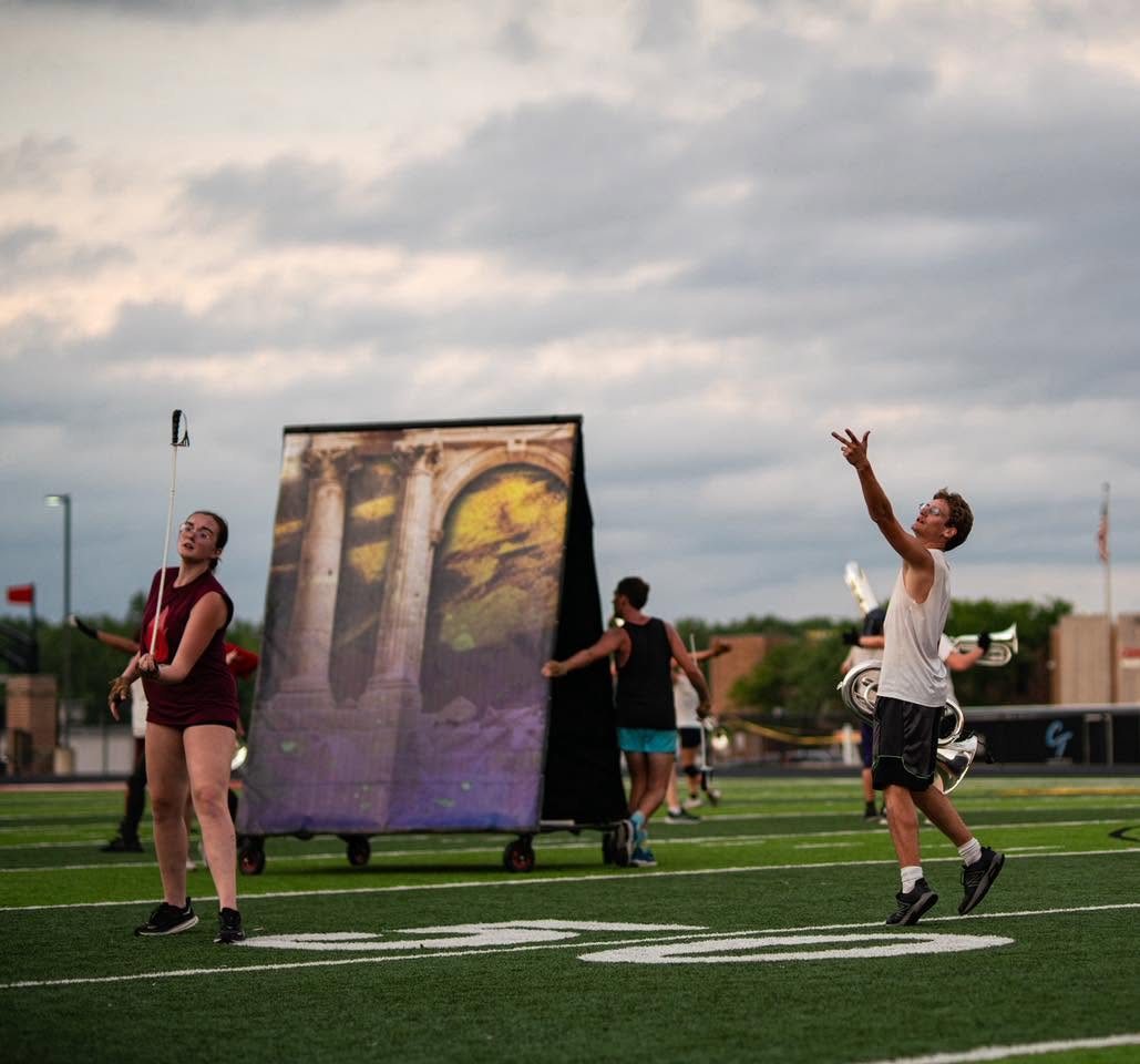 Cincinnati Tradition performer with the collapsible frame prop on the field